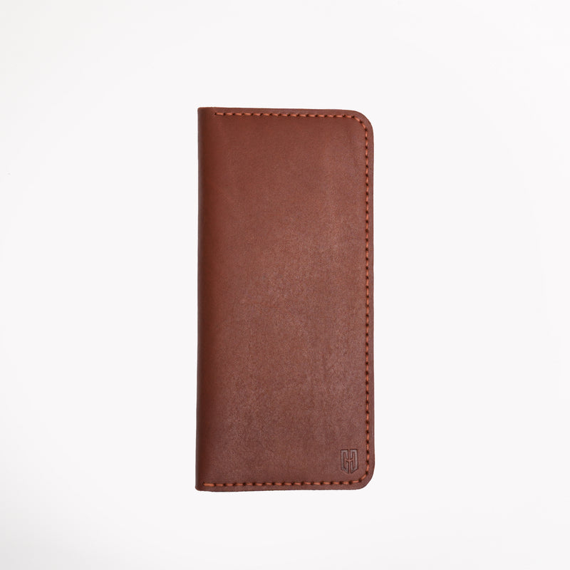 Caprahem Travelling Wallet TW-01 in brown handmade leather — closed front view with embossed logo