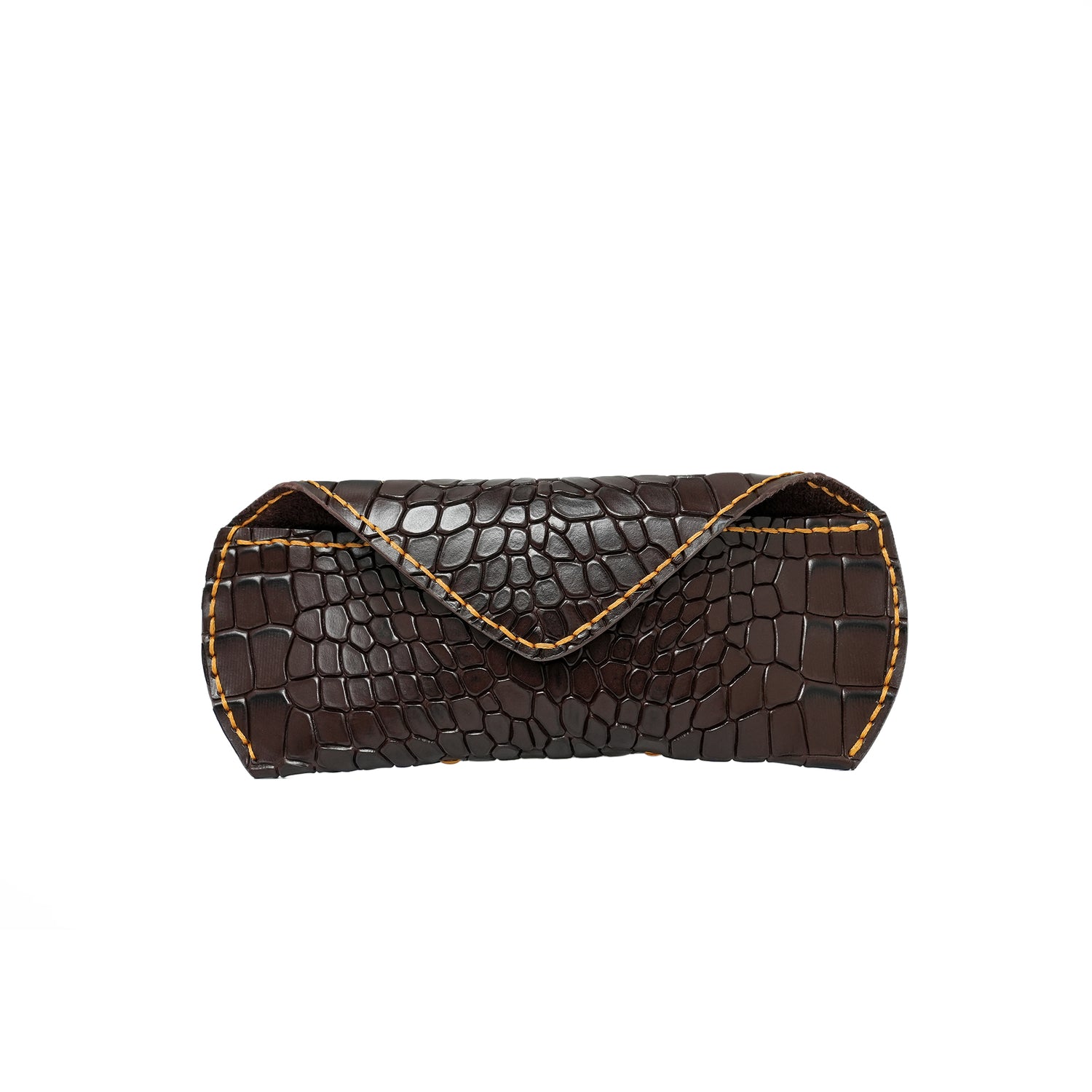 Caprahem handmade chocolate brown croc-embossed leather eyewear case for glasses and sunglasses — close-up of leather texture and stitching