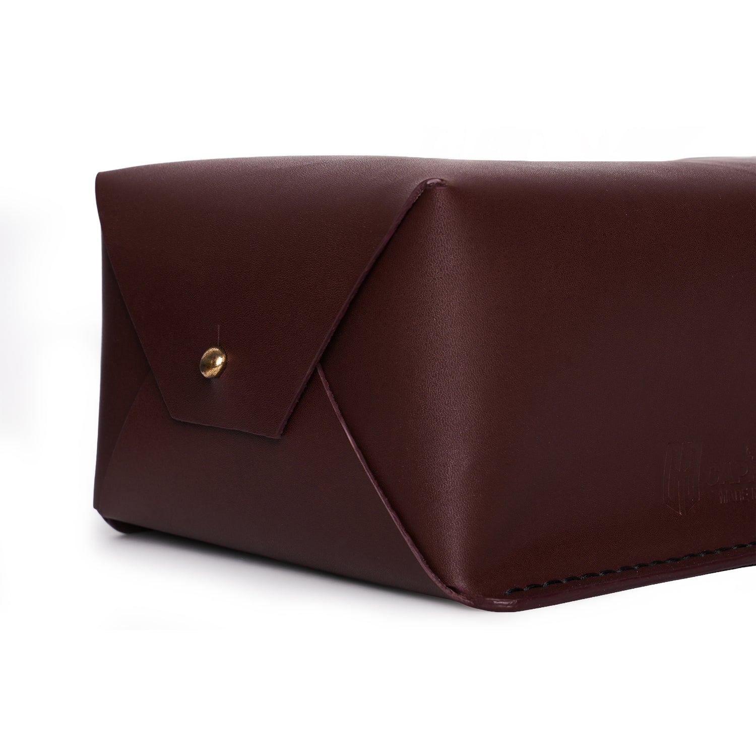 Caprahem TB-02 handmade burgundy leather tissue box cover for home and car — close-up of brass snap and contrast stitching